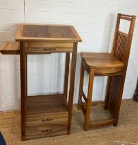 A Bespoke Arts and Crafts desk and chair by Kevin Stamper. the tall desk has drawers and side