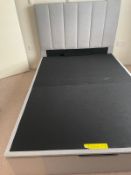 A 4ft 6 bed with lift up frame for storage underneath
