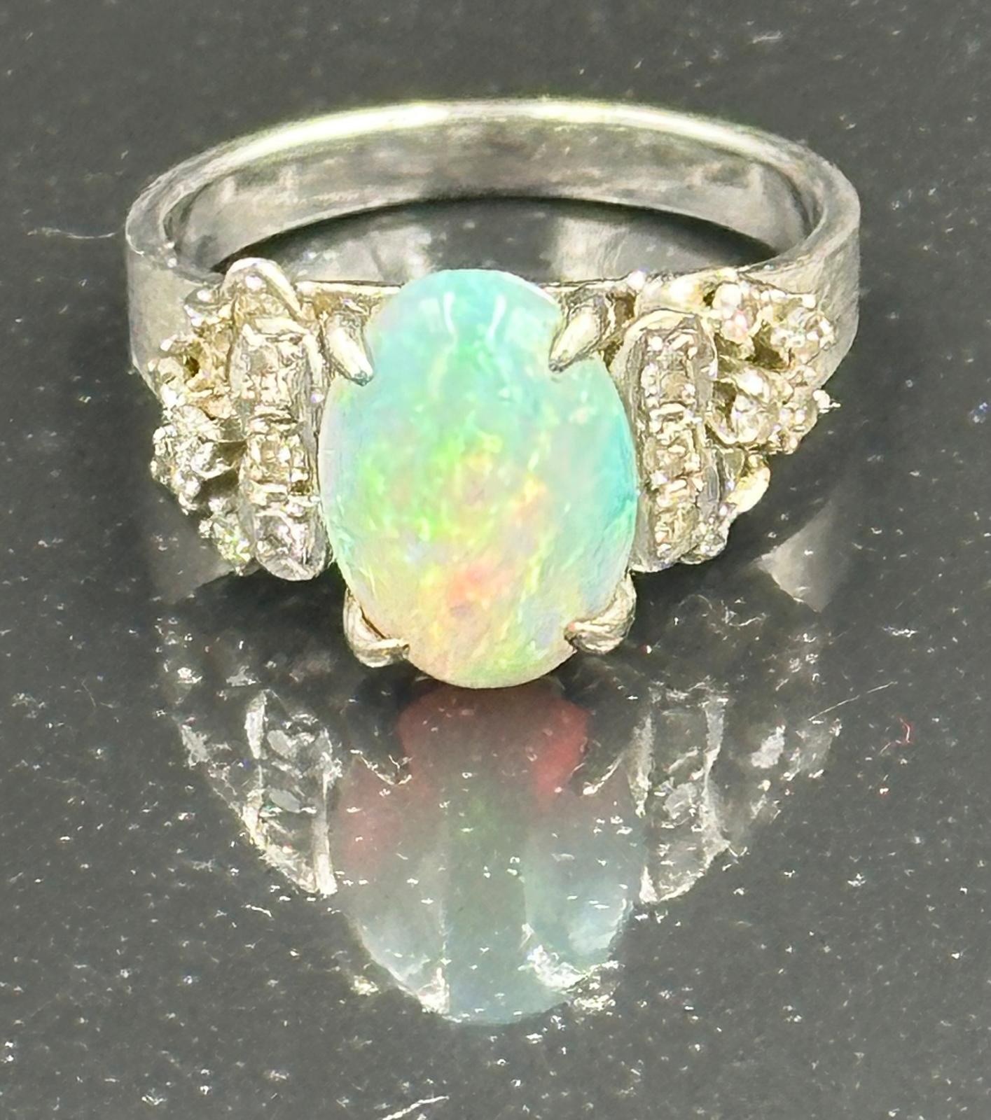 An opal and diamond ring on 14k white gold, approximate total weight 5.5g. Size L - Image 3 of 3