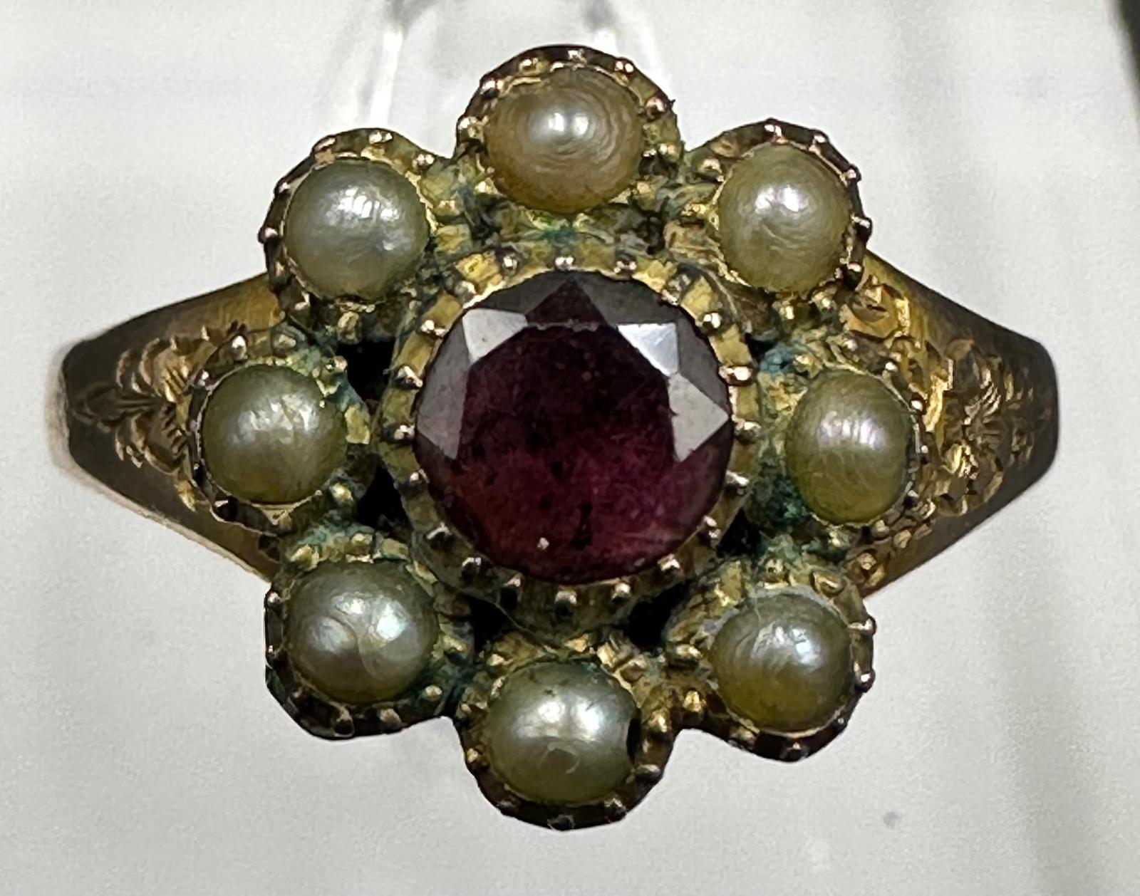 A 9ct gold daisy style ring with central ruby and seed pearls, approximate size Q and weight 2.2g - Image 2 of 2