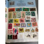 An album of UK and world stamps, various countries to include China, Germany and Russia.