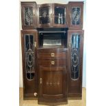 An oak Art Deco cabinet comprising of two drawers four glazed cupboards and central mirror (H200cm