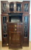 An oak Art Deco cabinet comprising of two drawers four glazed cupboards and central mirror (H200cm
