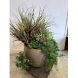 A large round ribbed planter with artificial perennial plants (H46cm)