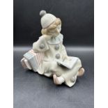 A Lladro figure of Girl with accordion Number 1178