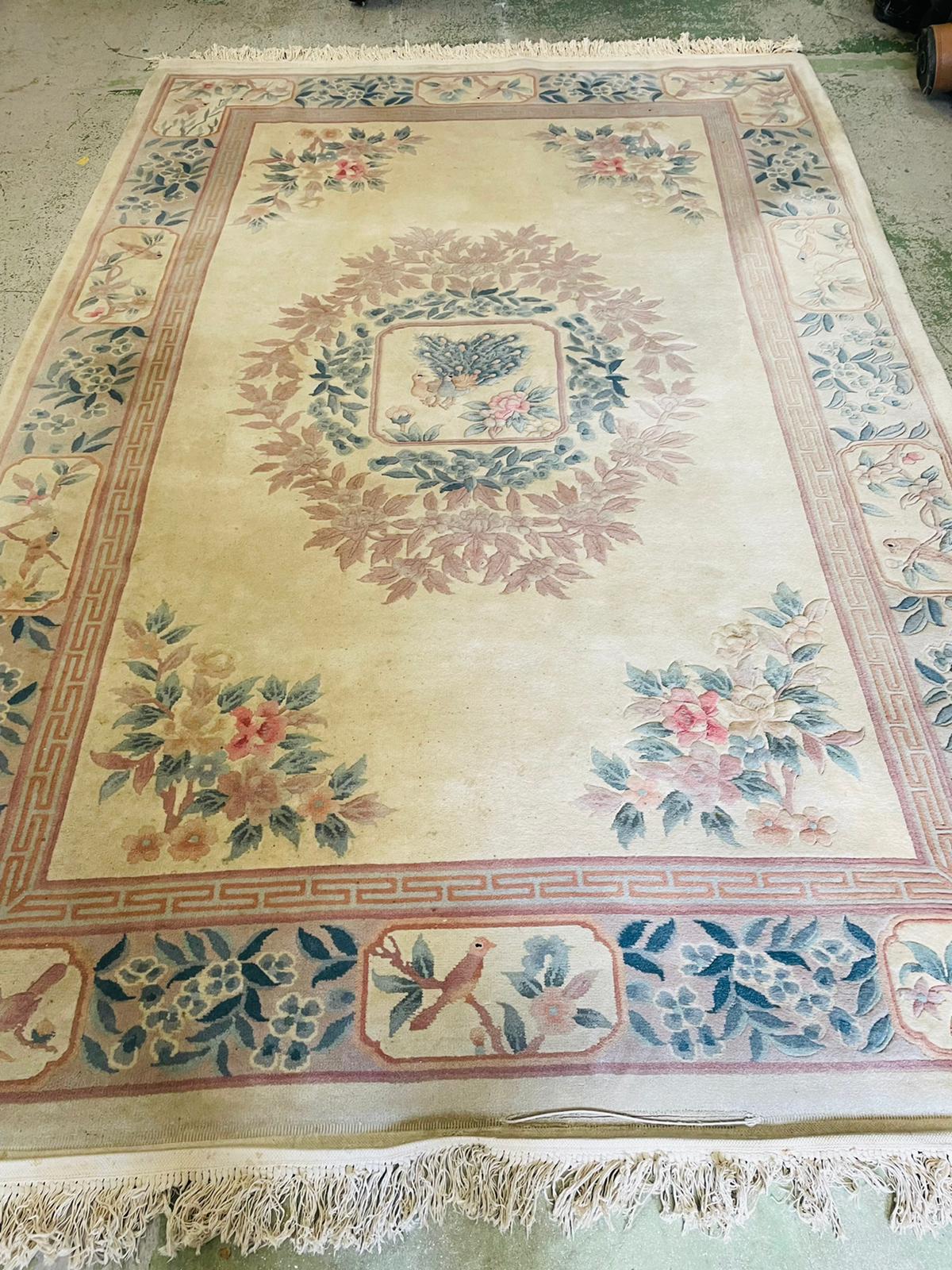 A wool rug with white grounds and central flower shield and geometric boarder (186cm x 280cm) - Image 3 of 4