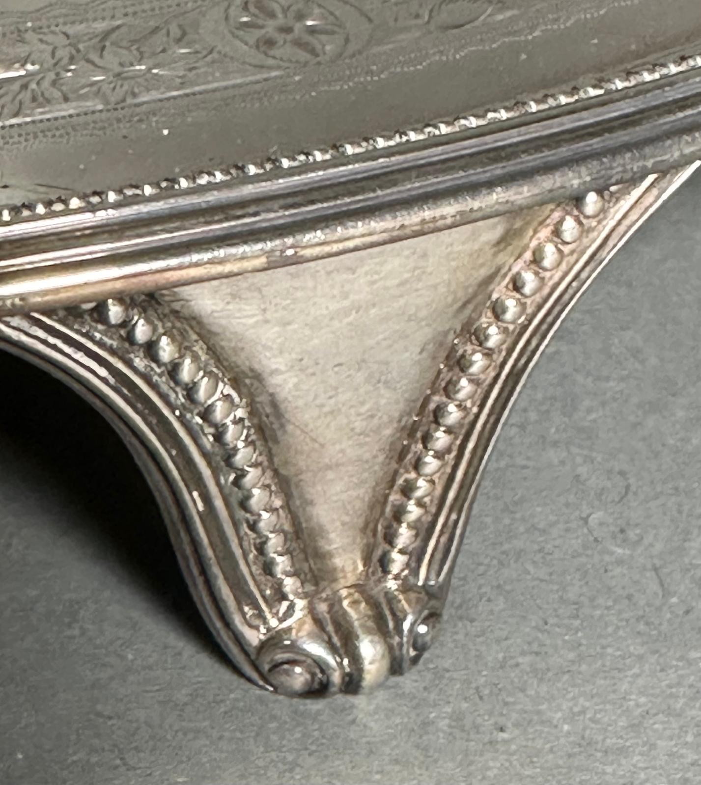 A William IV silver tray on four feet, approximately 43.5cm in length and an approximate total - Image 2 of 5