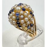 An Arabian gold sapphire and seed pearl cocktail ring, approximate total weight 8.4g