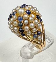 An Arabian gold sapphire and seed pearl cocktail ring, approximate total weight 8.4g