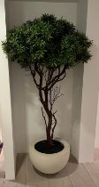 An artificial tree in a white pot (H210cm)