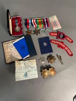 A set of WWII medals 1939-45 Star, The France and Germany Star, The Defence Medal and 1939-45