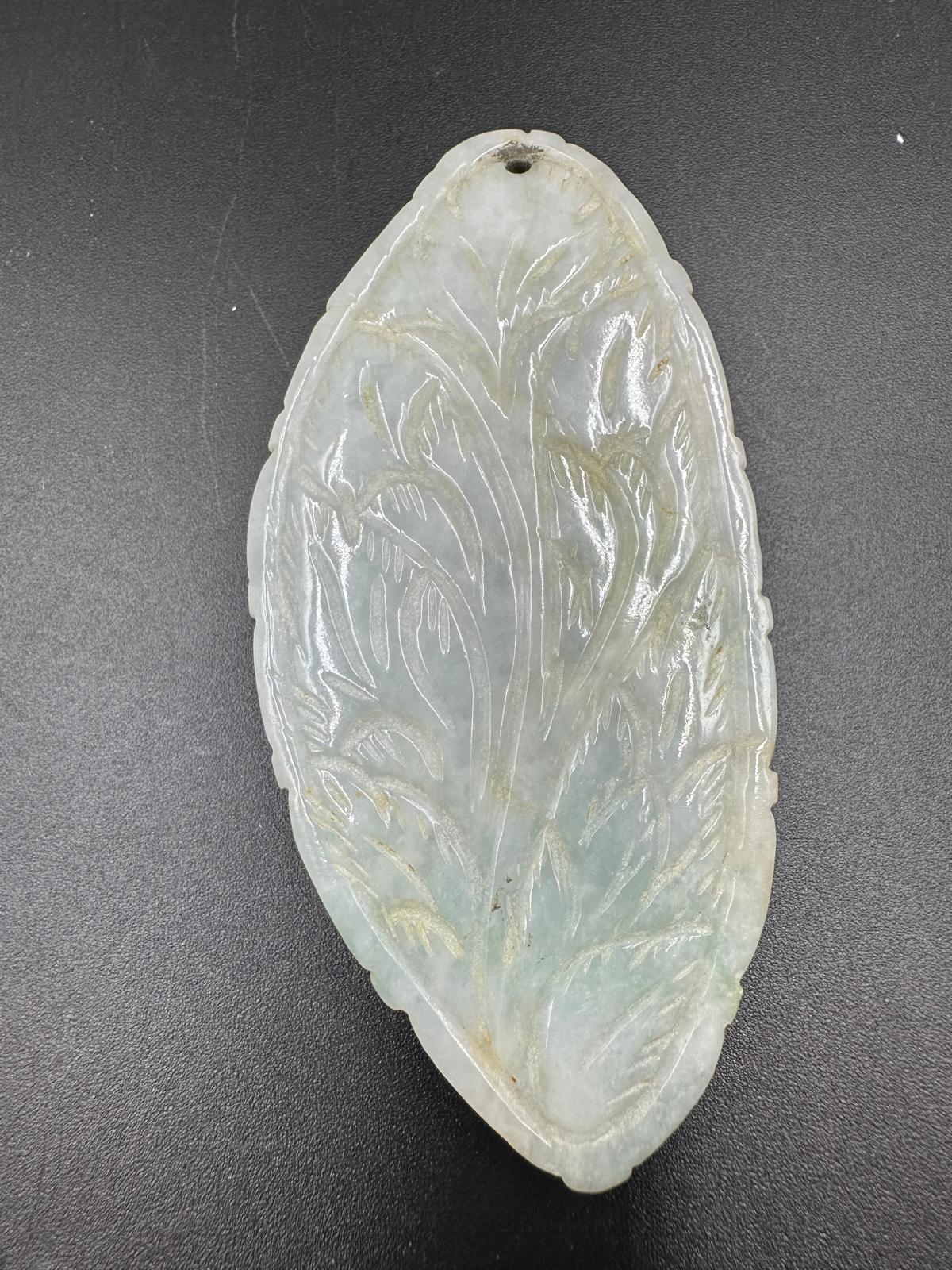 A Chinese jade carved pendant, approximate weight of 74g - Image 2 of 4