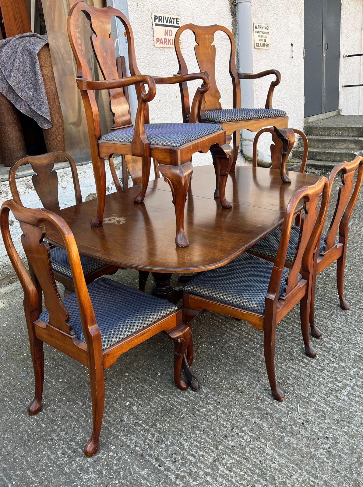 A mahogany dining table with twin pedestal and eight chairs (H75cm W183cm D112cm with three leaves - Image 3 of 8