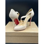 A Pair of Christian Louboutin Decalcoco 100 Nappa Shiny Size 38.5 with original box, bag and