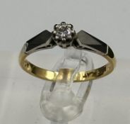 An 18ct gold and platinum ring
