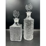 Two Whitefriars clear glass decanters in a moulded bark style form