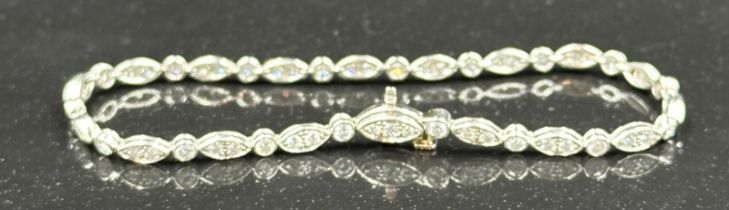 Tiffany diamond bracelet mounted in platinum. Signed Tiffany 950. Total diamond weight approximately