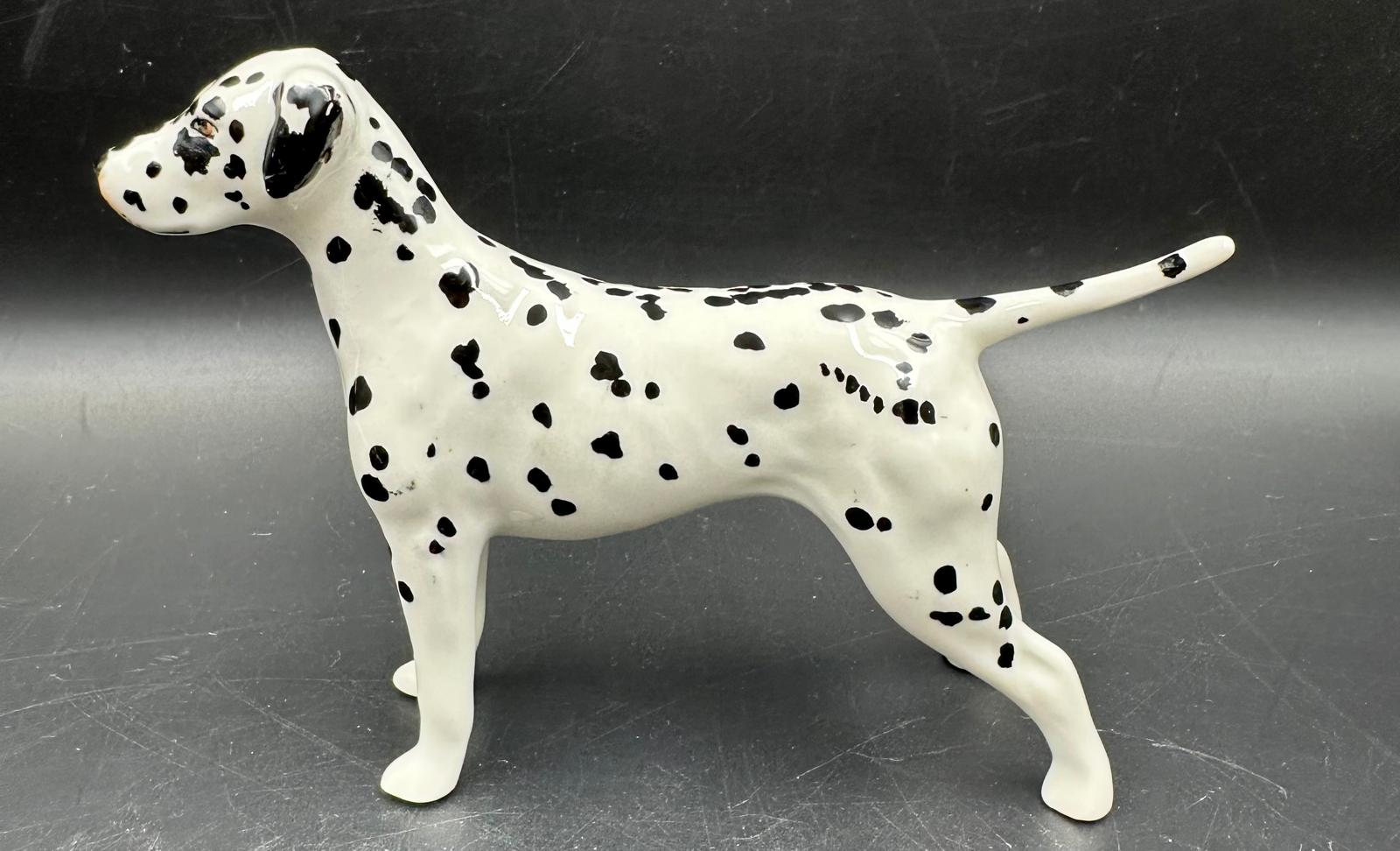 A Beswick figure of a Dalmation dog (8.5cm High) along with a Royal Copenhagen porcelain puppy. - Image 2 of 4