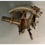A vintage brass sextant by Kelvin and Hughs on London stamped 1917