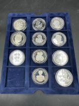 Eleven silver collectable Crown coins celebrating the life of Princess Diana by the Westminster