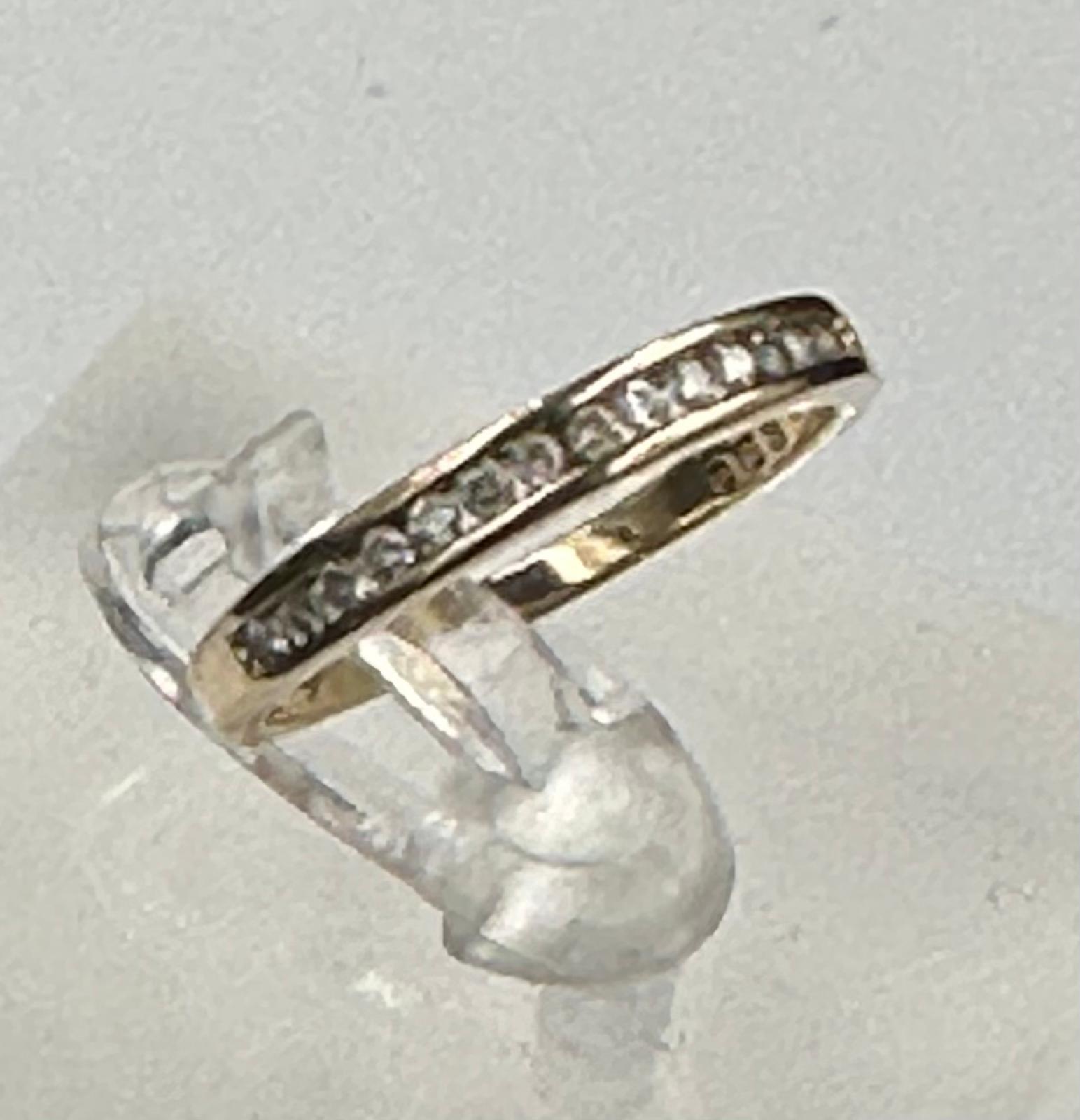 A 9ct gold partial eternity diamond ring with an approximate weight of 1.6g - Image 2 of 2