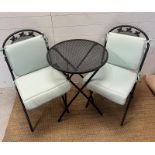 A metal bistro set by Kettler