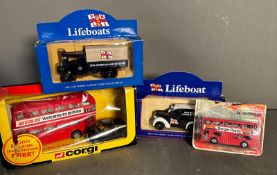 Four boxed toy cars, Corgi lifeboats, a Corgi London bus and black cab and a Matchbox bus