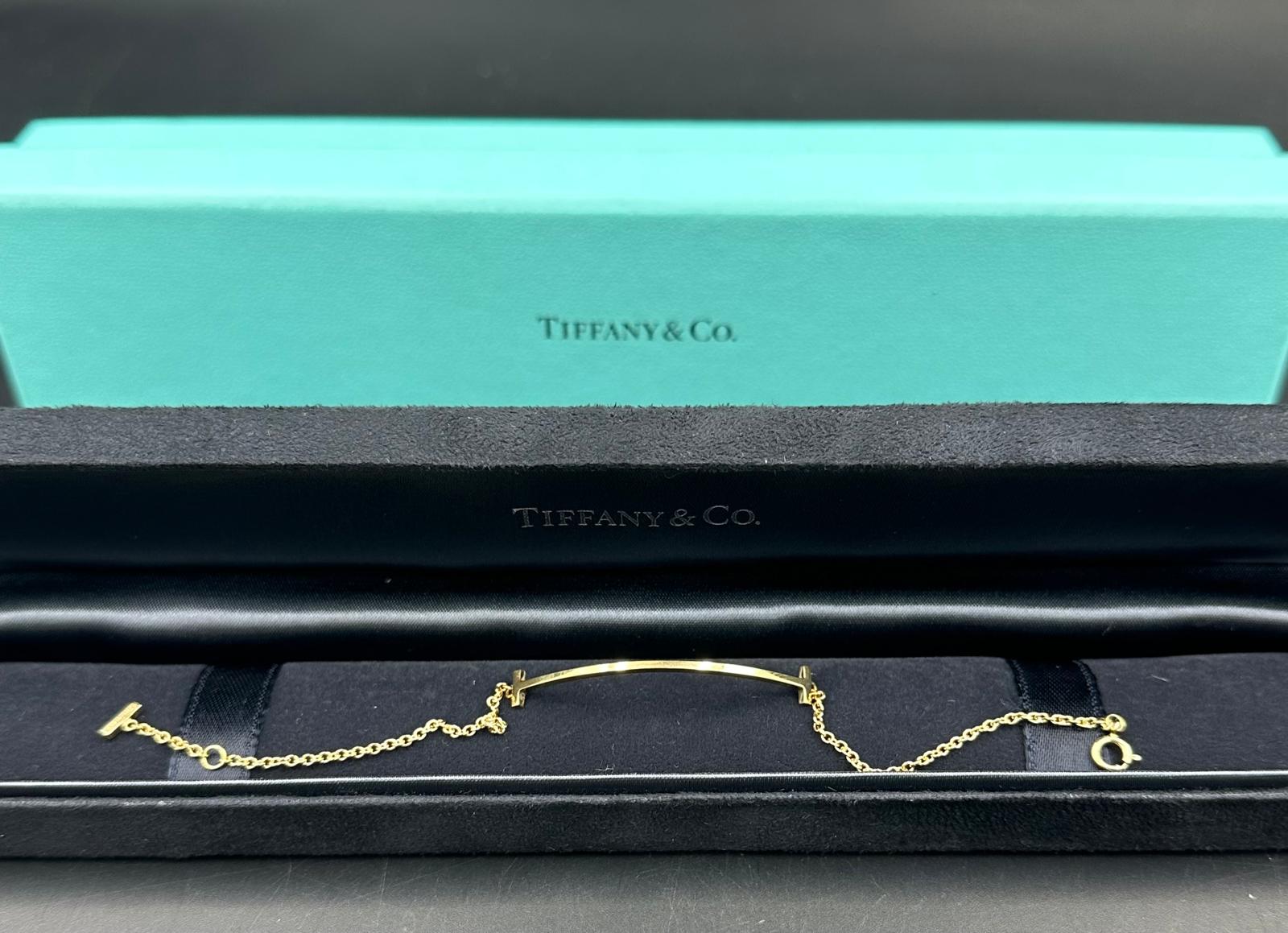 A Tiffany & Co Tiffany T Smile bracelet in 18ct yellow gold in original box. - Image 2 of 2