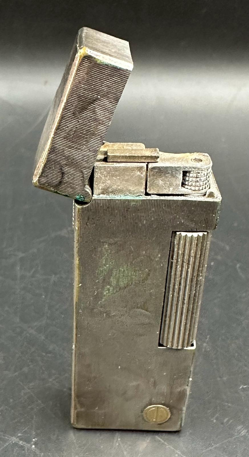 A Dunhill white metal lighter in original box with original paperwork, cards etc. - Image 2 of 5