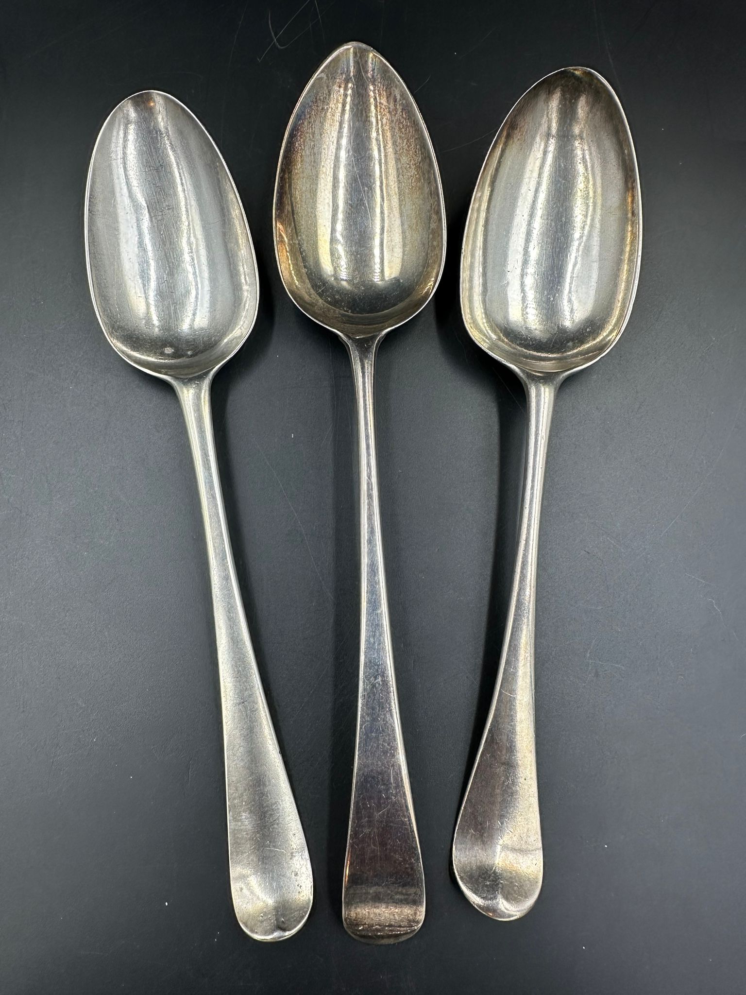 Three silver spoons,two late 18th Century and the other hallmarked for London 1807