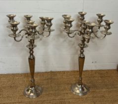 A pair of large candelabra centre piece with seven arms (75cm)