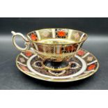 A Royal Crown Derby cup and saucer