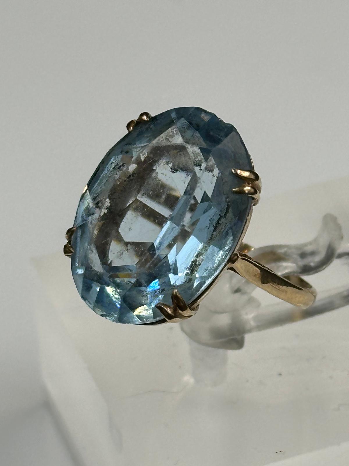 A 9ct gold and blue topaz ring. Size N - Image 2 of 2