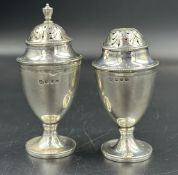 A pair of silver cruets by Samuel Walton Smith, hallmarked for Birmingham 1890