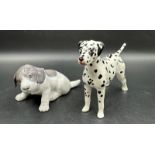 A Beswick figure of a Dalmation dog (8.5cm High) along with a Royal Copenhagen porcelain puppy.