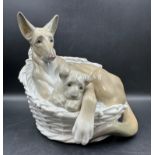 A Lladro figure of a German Shepherd with puppy number 4731