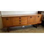 A Mid Century sideboard with string inlay and drop handles (H73cm W184cm D46cm)