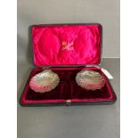 A pair of silver scalloped dishes by Atkins brother, hallmarked for Sheffield 1913, cased.