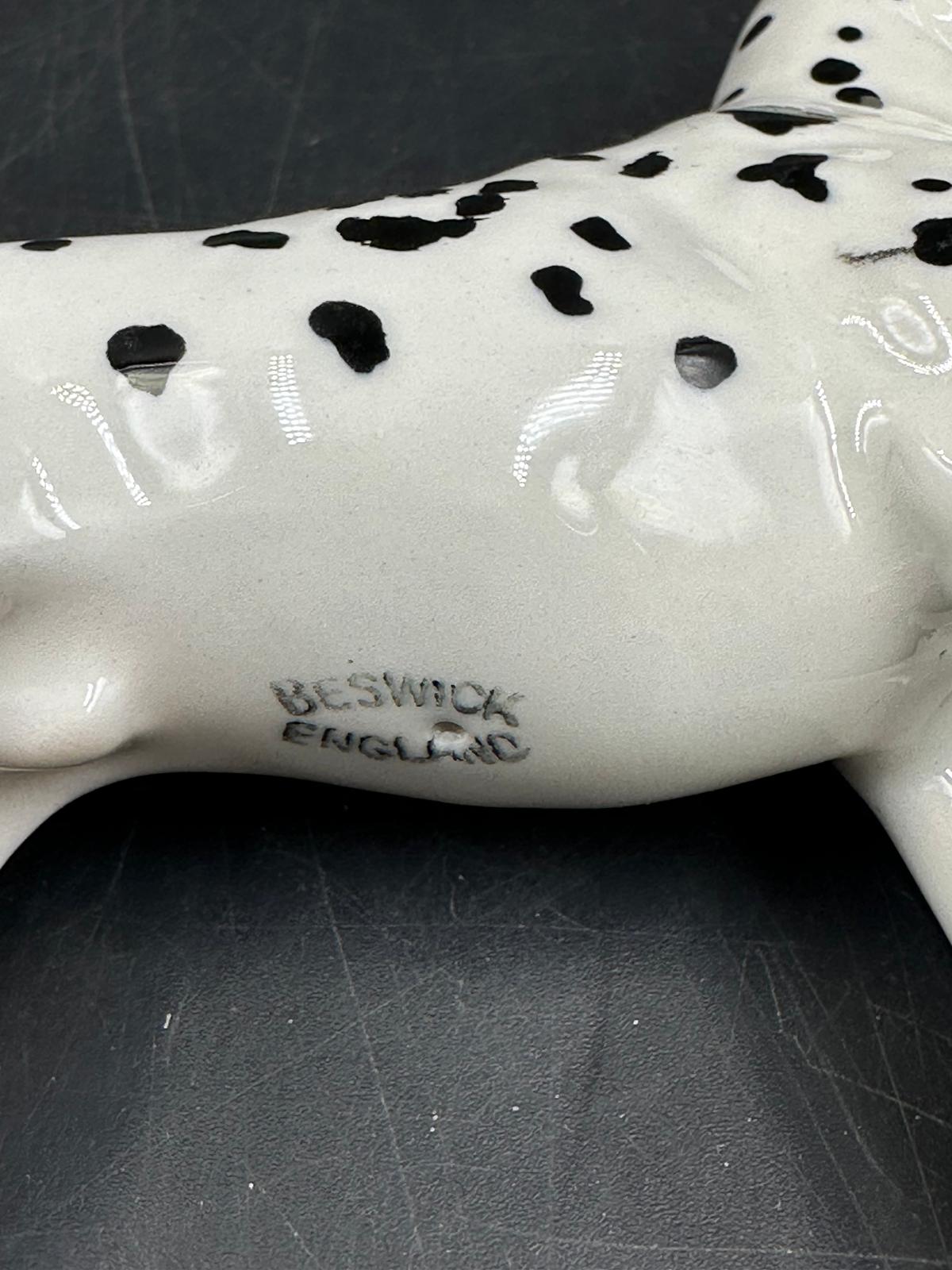 A Beswick figure of a Dalmation dog (8.5cm High) along with a Royal Copenhagen porcelain puppy. - Image 3 of 4