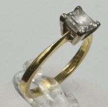 Princess cut diamond solitaire ring mounted in 18ct gold. Hallmarked 750. Central diamond weighing