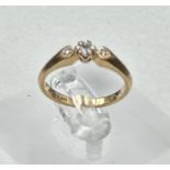 A 9ct gold and diamond ring approximate size M
