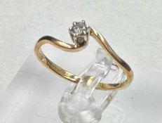 A 9ct and diamond wishbone style ring, approximate size P 1/2and weight 1.5g.