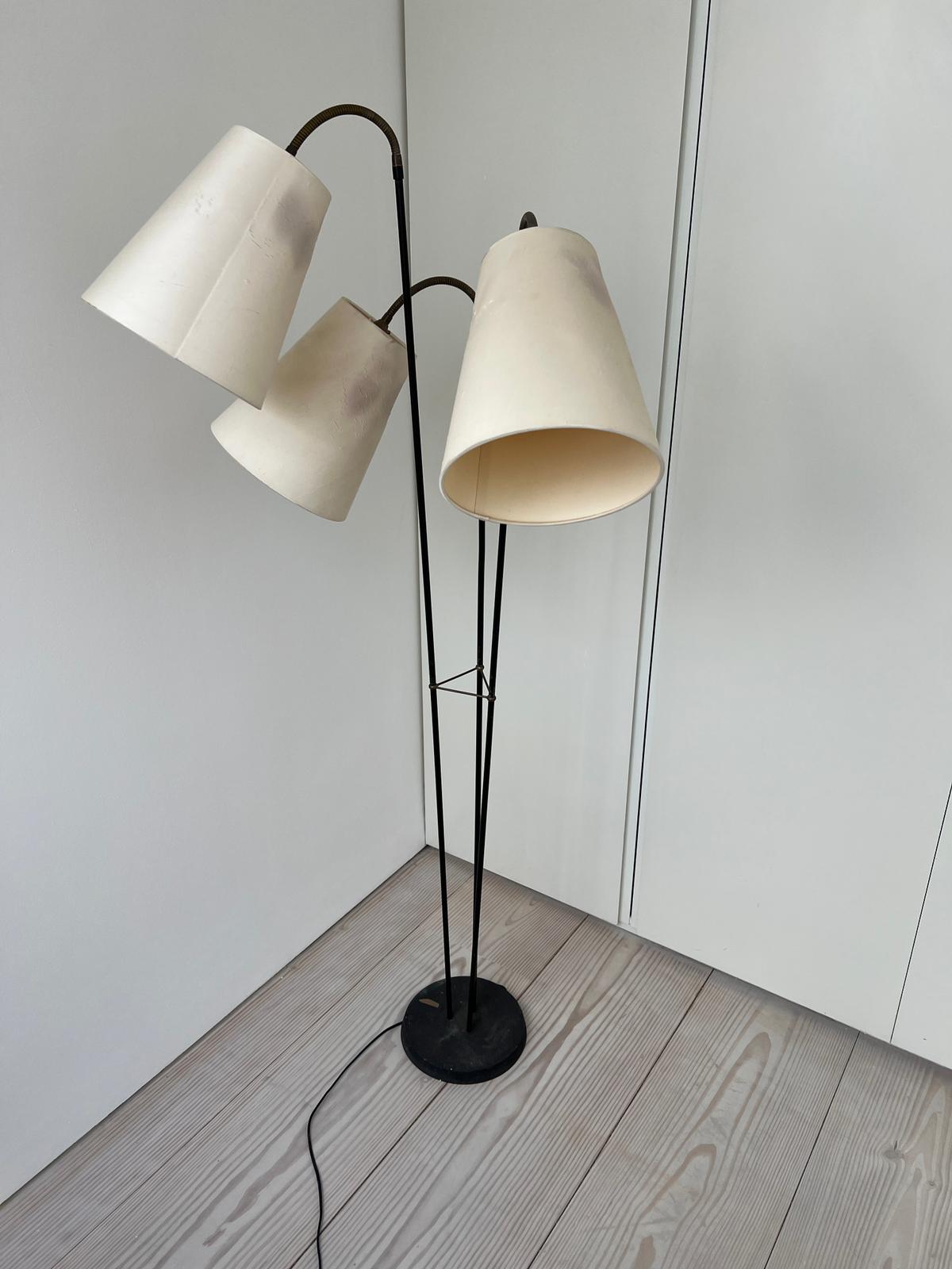 A three arm floor lamp, brass and black enamelled stem with articulated three arm lamps possibly - Image 3 of 4
