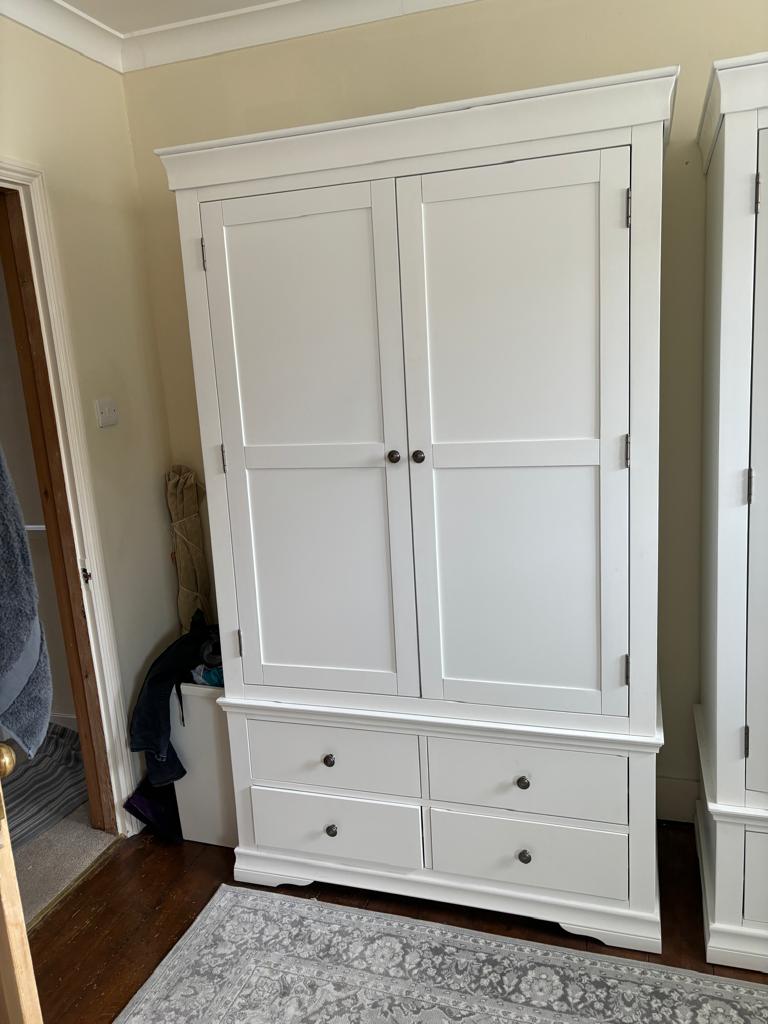 A white two door wardrobe with four drawers below and hanging space above (H200cm W114cm D55cm) - Image 2 of 4