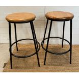 A pair of industrial style bar stools with wooden seats (H66cm)