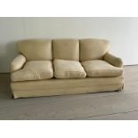Three seater sofa by Peter Dudgeon (W207cm D86cm)