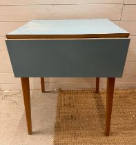 A Mid Century drop leaf kitchen table with pale blue top (H76cm W60cm D51cm)