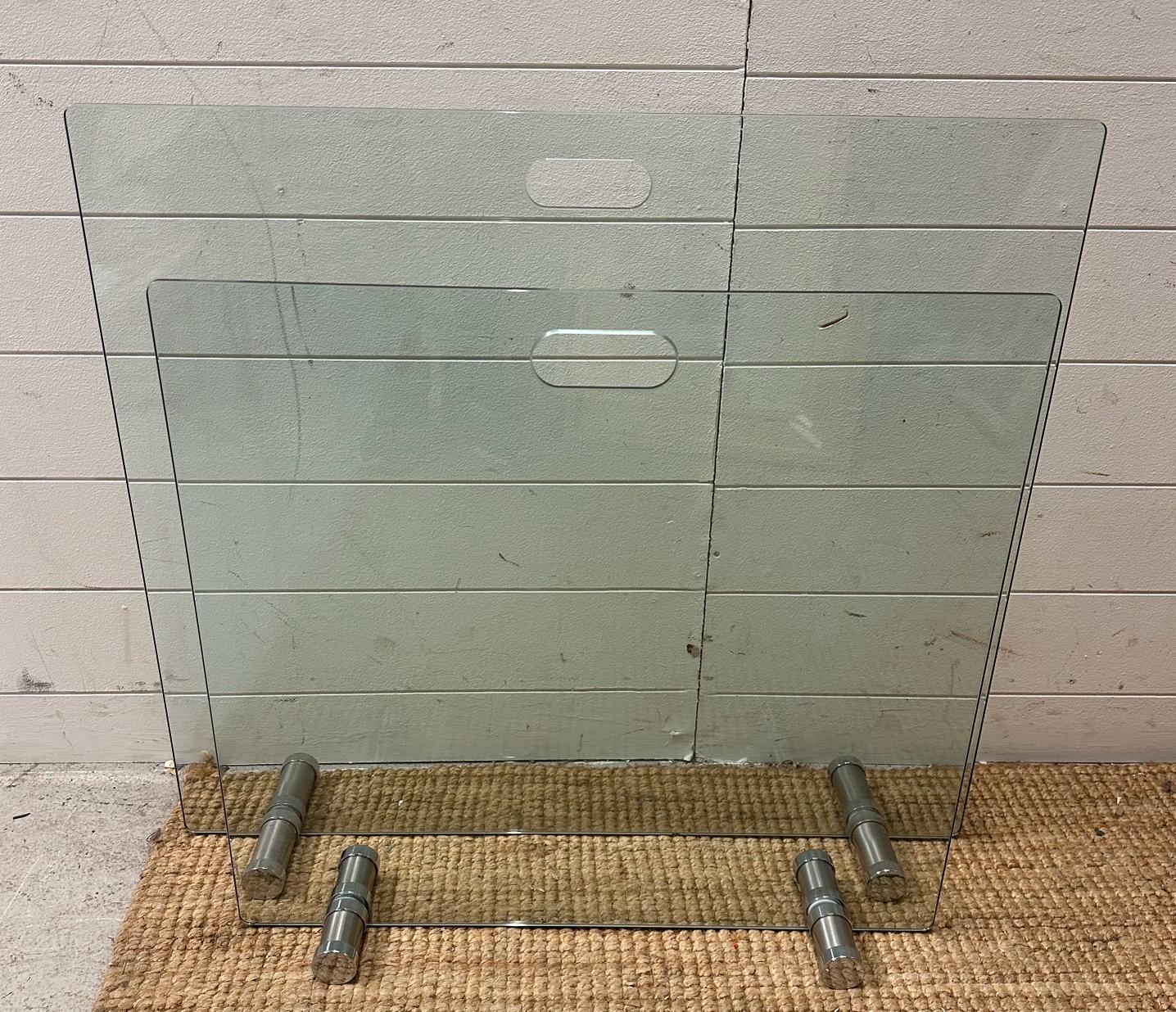 Two contemporary glass and chrome fire screens (61cm x 65cm and 80cm x 70cm) - Image 2 of 3