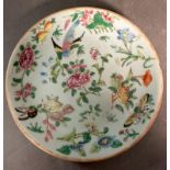 A Chinese Canton celadon ground and famile rose plate