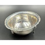 A silver three footed sugar bowl on lion paw feet by Wakely & Wheeler, approximate weight 65g,